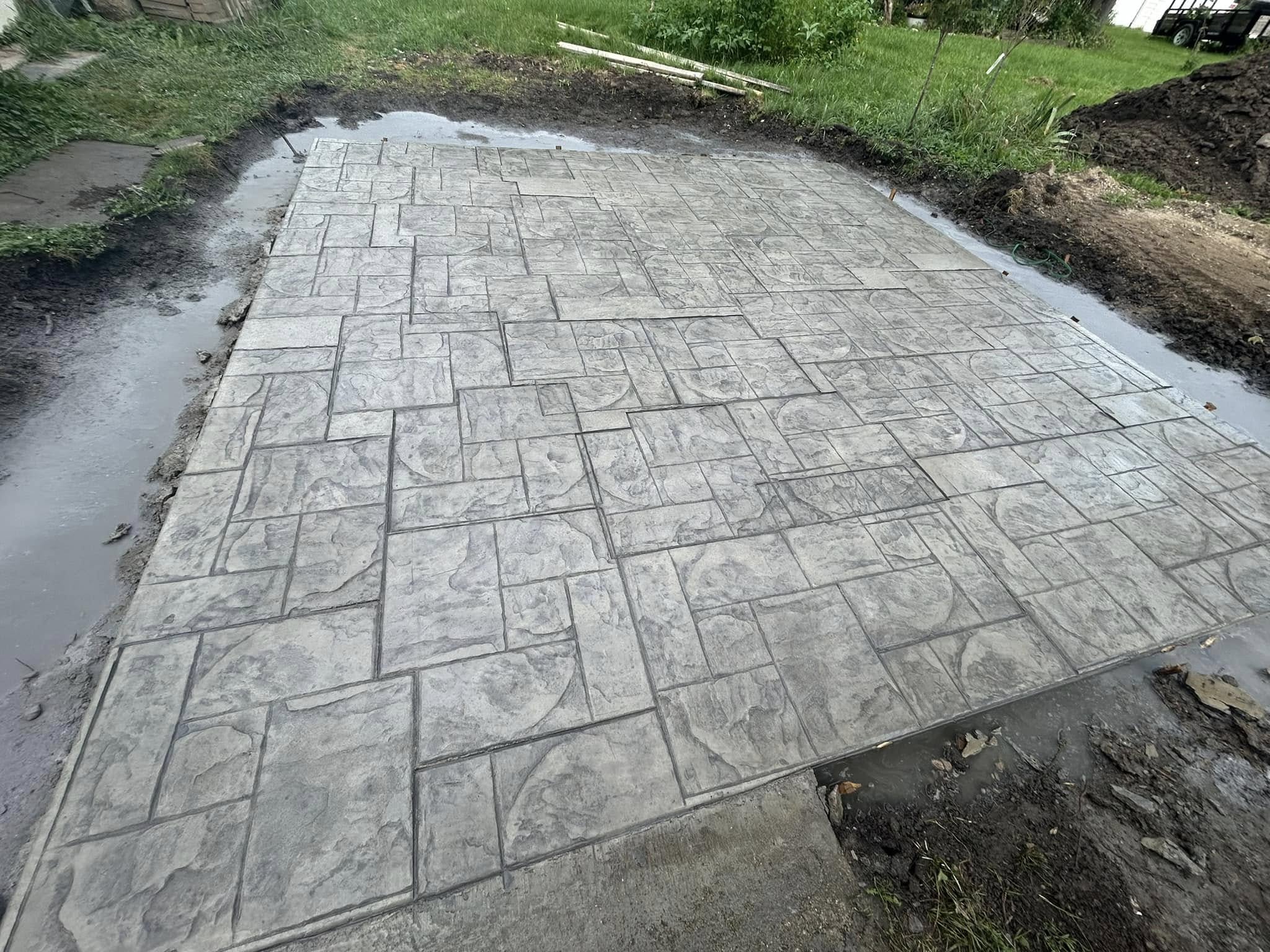 Elegant stamped concrete patio enhancing outdoor aesthetics and functionality